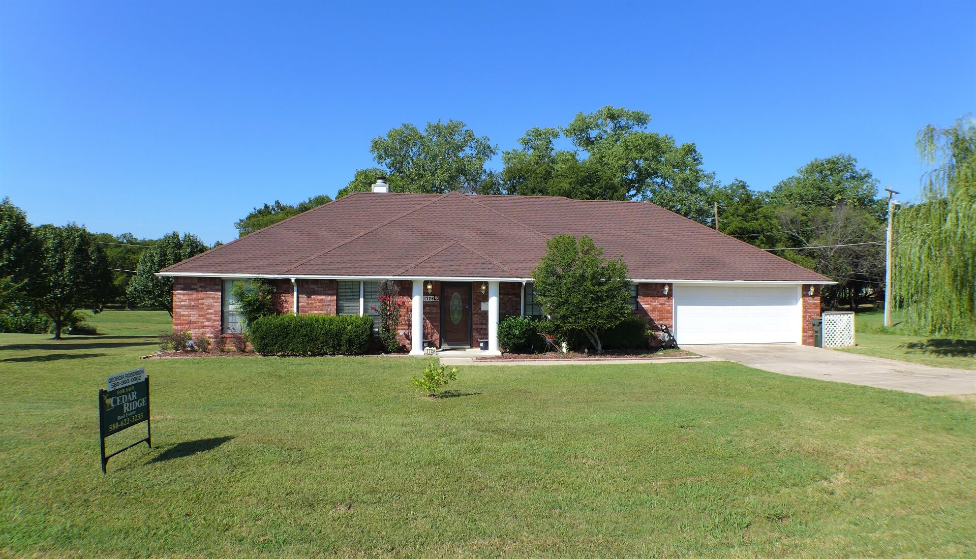 ACROSS THE STREET FROM THE GOLF COURSE Cedar Ridge Real Estate